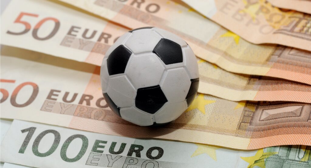 Rubber football on euro banknotes